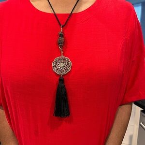 Handmade pendant with tassel